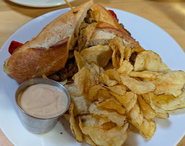 The Old Goat signature dishes Charley Apple Chicken
Emily Reuben
The Mac Daddy
